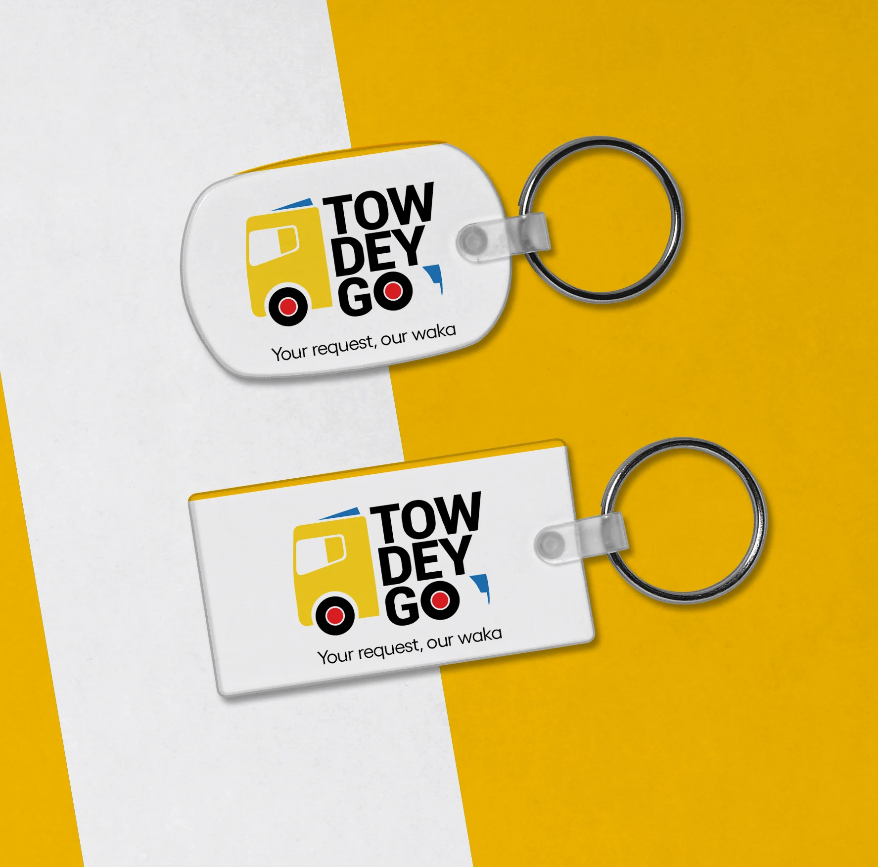 TowDeyGo keychain mockups showing the vehicle symbol and stacked name